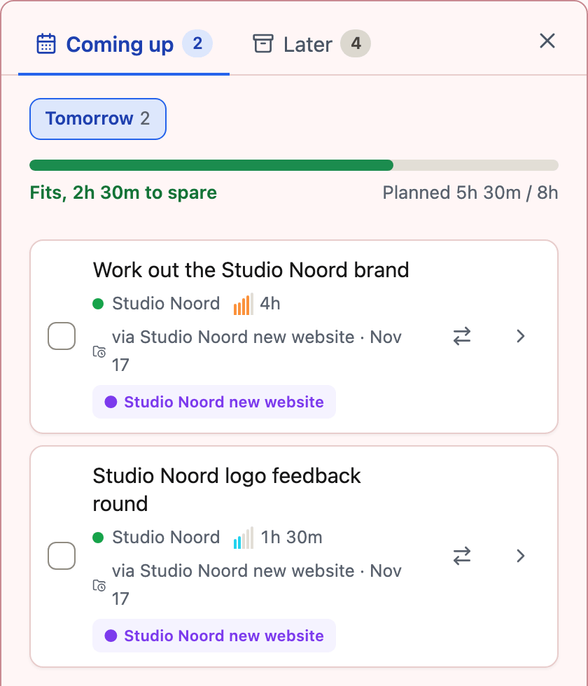 The panel on the Coming up tab. At the top the day Tomorrow with a capacity bar showing that it fits, and below it two tasks for tomorrow.